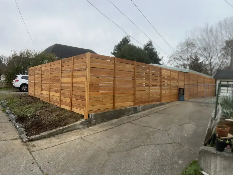 Wood fencing installed by the Deep Roots crew