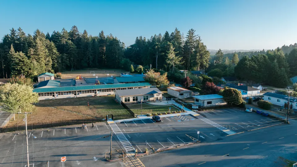 Aerial view of a school campus and its grounds on the North Coast